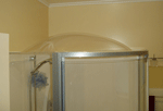 Showerdome fitted to a corner shower unit